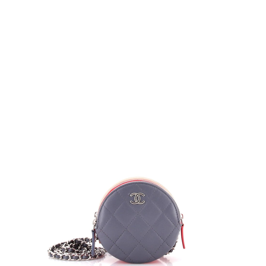 Chanel Round Compartment Clutch with Chain Quilted Lambskin: Round Compartment Clutch is a literal name, a circular lambskin body split inside so contents do not collect in a single pile at the bottom. Small at 4.5 in across, 4.5 in high and 2 in deep, the volu