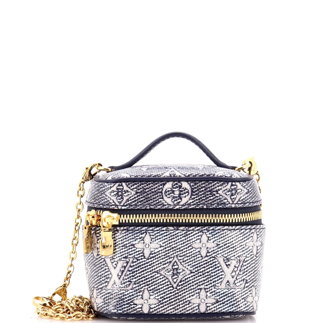 Louis Vuitton Vanity Case Monoglam Jacquard Canvas: A rigid little box with the Monoglam jacquard pulled over a structured shell. At 4.5 in wide x 4 in high x 3 in deep it is the smallest useful format in the vanity family, holding a phone, a compact