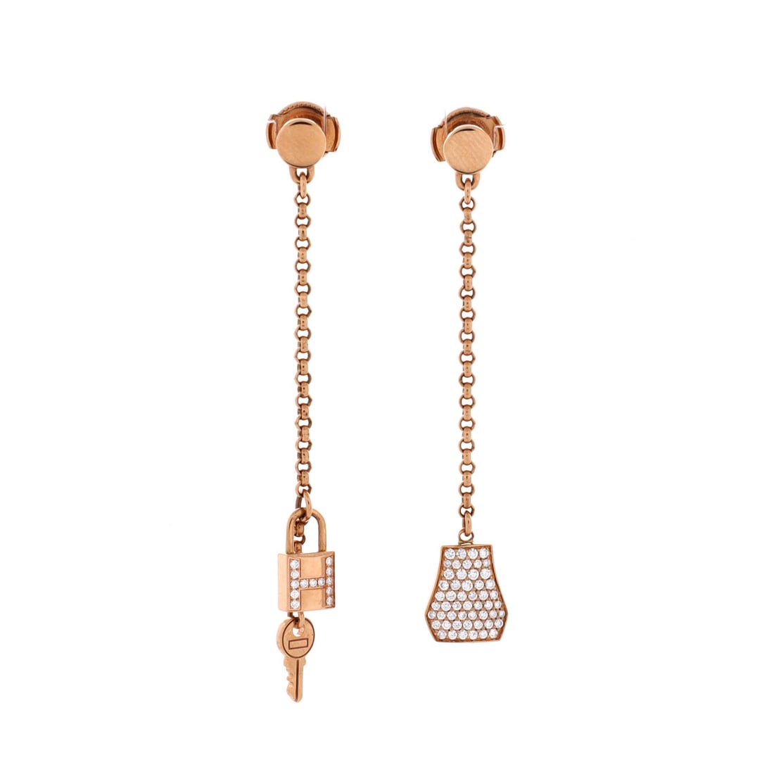Hermes Kelly Clochette Drop Earrings 18K Rose Gold and Diamonds: Diamonds sharpen the clochette outline on this pair, catching light down a bell that hangs a full 2 in from the lobe. A 0.35 in width keeps them slim against the neck, so brilliance rather than bulk c