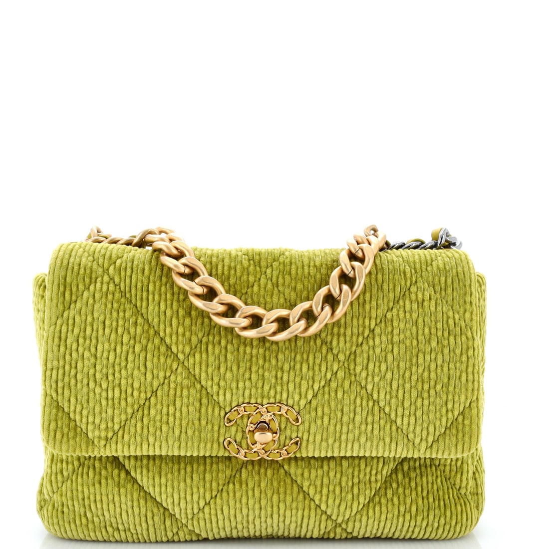 Chanel 19 Flap Bag Quilted Corduroy: Corduroy changes the tactile argument of a 19 entirely, the wale running against big quilted diamonds for a matte, ridged face. This one is a long twelve inches wide but only 6.5 tall and 3 deep, a fl