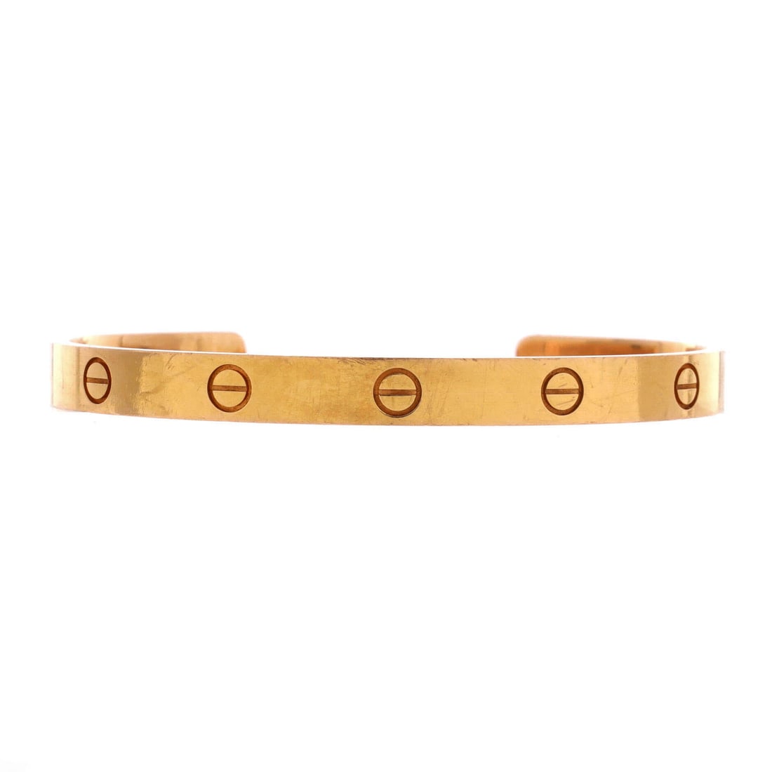 Cartier Love Cuff Bracelet 18K Rose Gold: The Love Cuff drops the screwdriver ritual: open at the back, it flexes on and off the wrist in one motion. Rose gold at 6.2 mm holds the classic width, so it looks like the bangle even though it wear