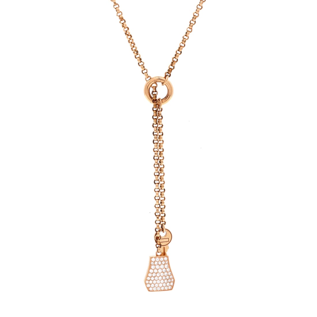 Hermes Kelly Clochette Pendant Necklace 18K Rose Gold with Diamonds: An adjustable chain running 15 to 16.5 in holds the clochette pendant high on the collarbone, above a neckline instead of lost inside it. Rose gold keeps the warmth while the diamonds outline the bell
