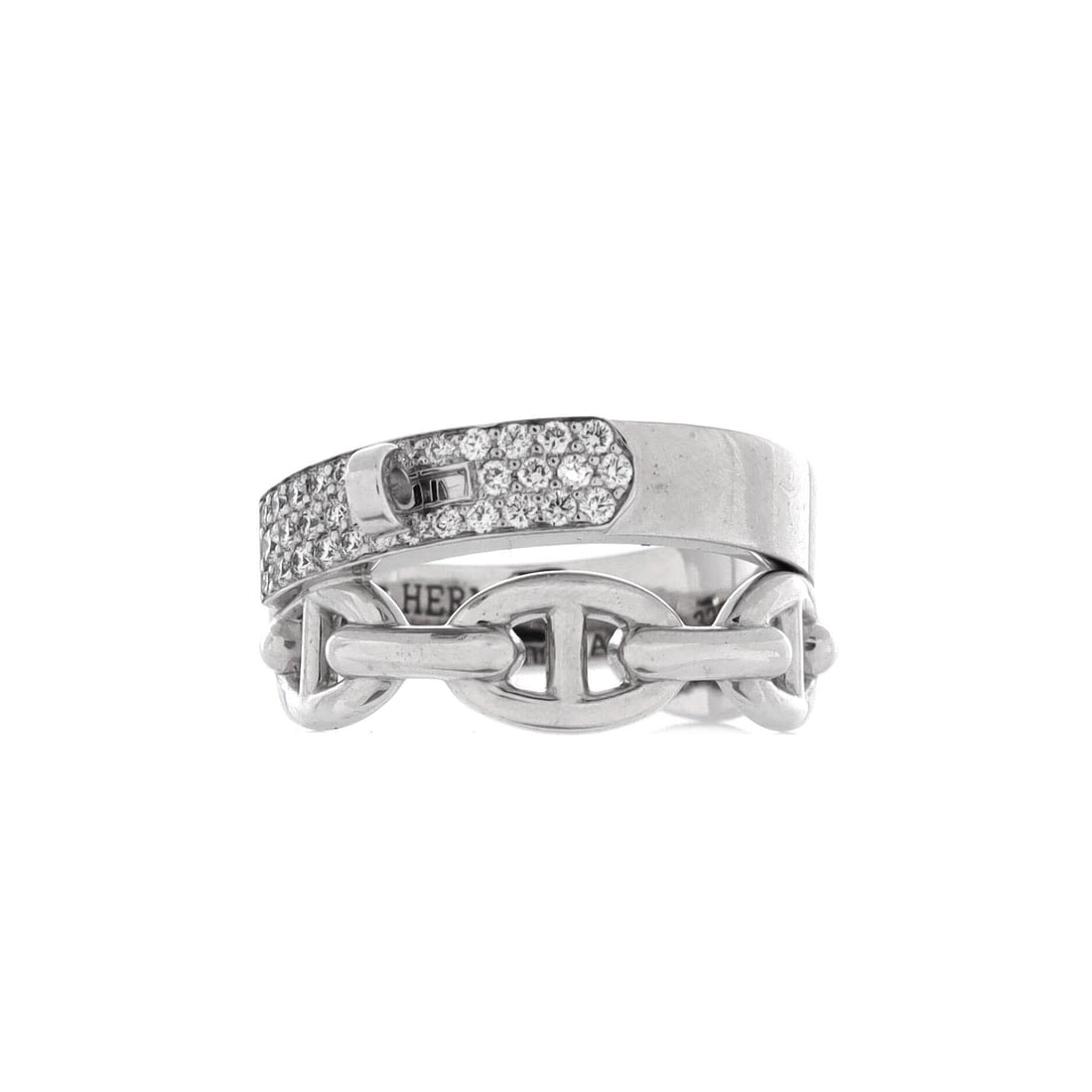 Hermes Kelly Double Tour Ring 18K White Gold with Pave Diamonds: Double tour means the band wraps the finger twice, and at 10.7 mm across the pave covers real ground, a statement ring rather than a stacker. White gold keeps the stones cold and bright over the strap