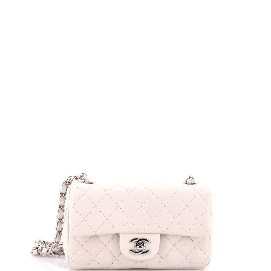 Chanel Classic Single Flap Bag Quilted Lambskin: Lambskin quilting is the plush end of the classic flap, and on a 7.5 x 5 x 2.5 in single flap the diamond pattern sits high and soft. A 23 in strap drop is genuinely crossbody; doubled to 12.5 in it b