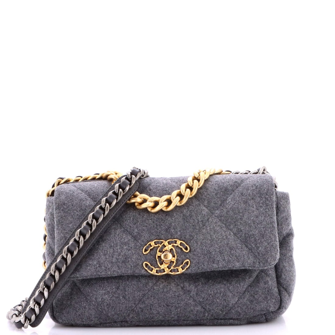 Chanel 19 Flap Bag Quilted Wool: Wool brings a dry, matte hand to the oversized quilt, and the fabric holds the diamond stitch with more crispness than lambskin manages. Ten by six by three inches keeps it in the line's everyday size