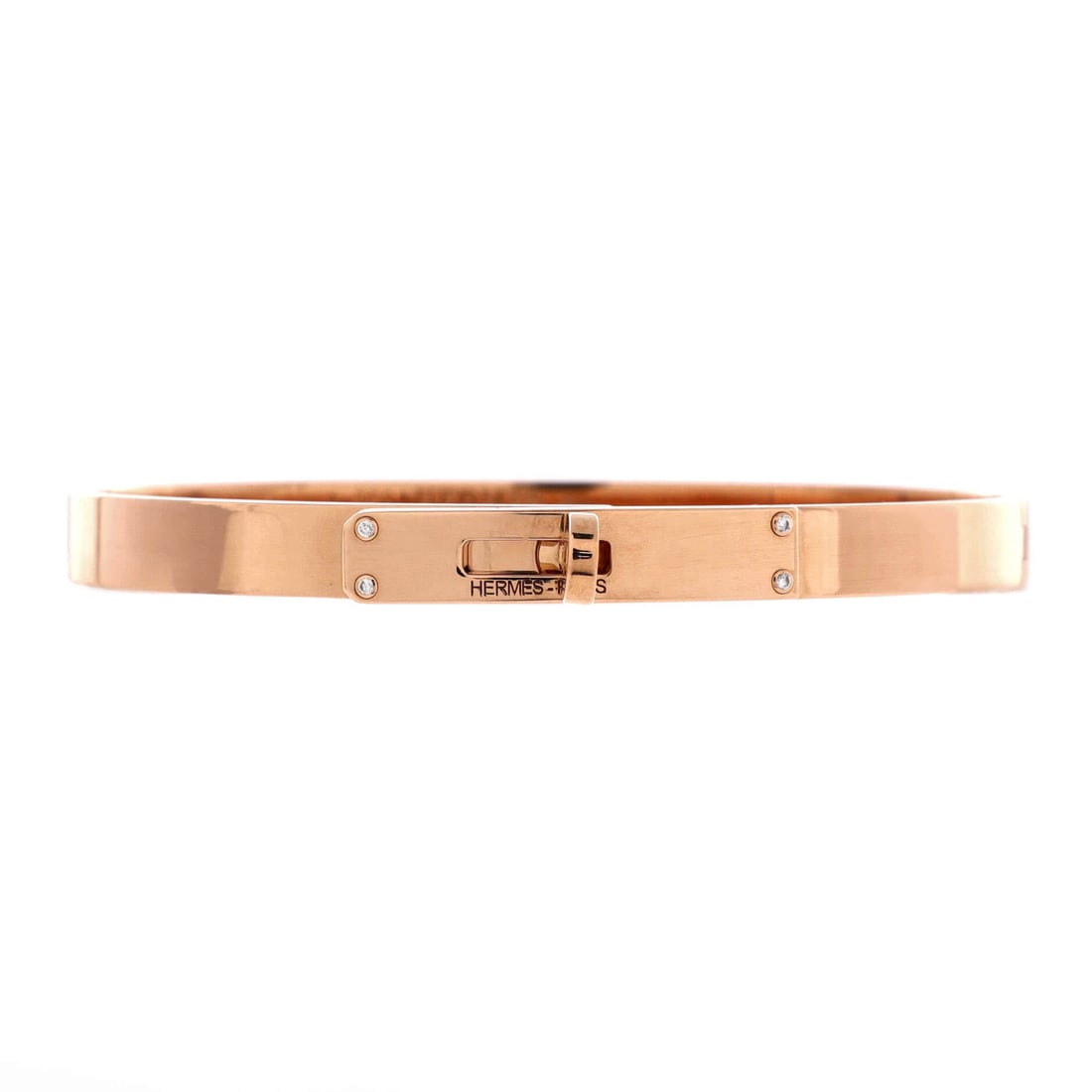 Hermes Kelly Bracelet 18K Rose Gold with 4 Diamonds: Four diamonds punctuate the Kelly bracelet rather than covering it, which leaves the 18K rose gold and the hardware motif in charge. At 5.55 mm the band is slim, easy under a cuff and easy alongside a