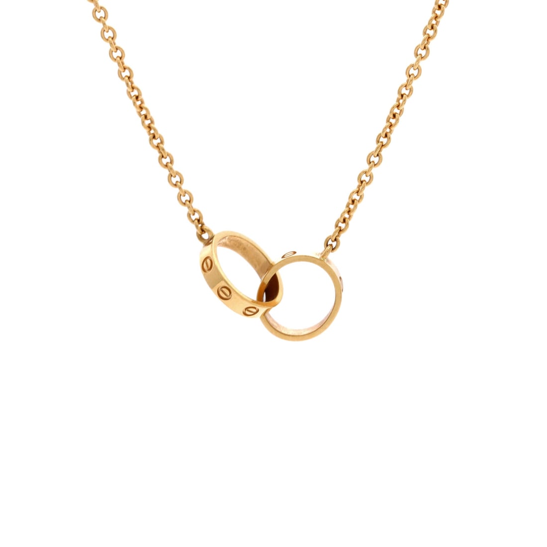 Cartier Love Interlocking Necklace 18K Yellow Gold: Yellow gold is where the Love screw motif began, and the interlocking pair here, 22 mm across and 2.6 mm thick, carries it in the warmest metal Cartier uses. The 17 in chain sits close to the throat. 