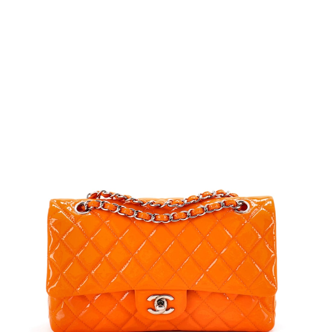 Chanel Classic Double Flap Bag Quilted Patent: Patent quilting gives this double flap a hard gloss that holds the diamond pattern crisp across the front panel. At W 10 x H 6 x D 3 in it lands in the medium range, close on the shoulder at a 9 in dr