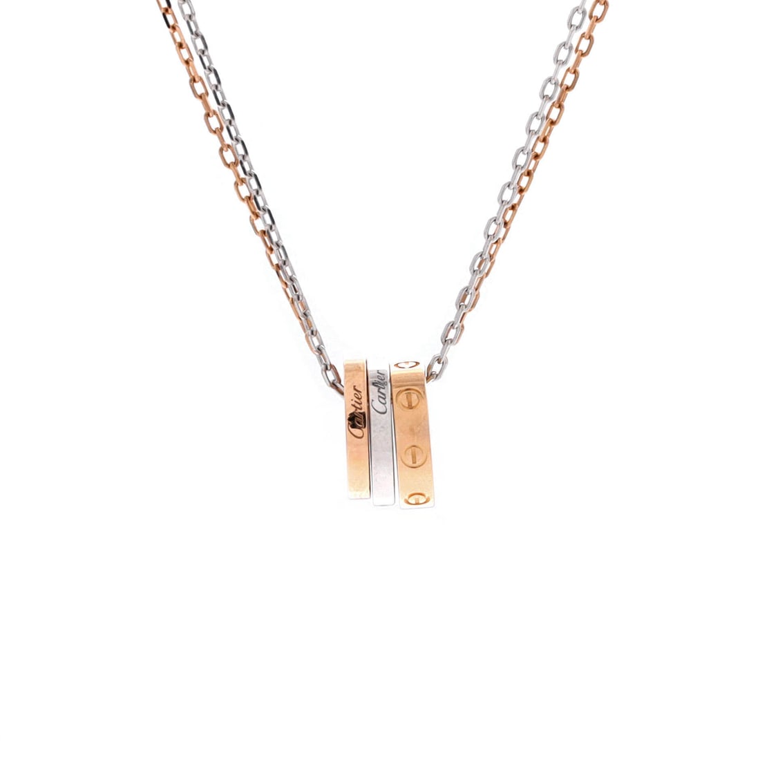 Cartier Love 3 Ring Pendant Necklace 18K Rose Gold and 18K White Gold with 6 Diamonds: Three interlocking Love rings hang as one pendant here, alternating rose and white gold with six diamonds spread across them. The motif measures 10.8 by 5.95 mm, small enough to sit at the collarbone 
