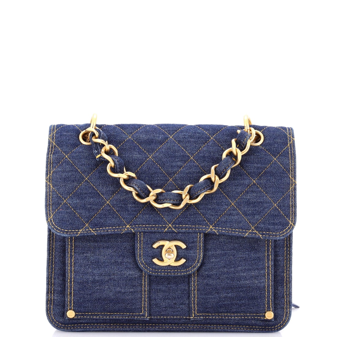 Chanel Double You CC Flap Backpack Quilted Denim: Denim on a Chanel backpack is a deliberately casual register, and the quilting keeps the fabric from reading plain. The Double You CC flap closure sits over a slim body of 10 inches wide, 8.5 tall and
