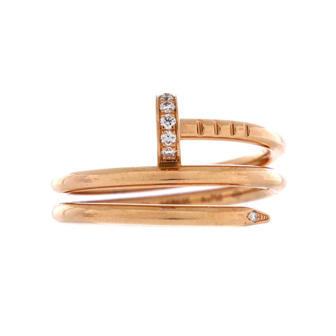 Cartier Juste un Clou Double Ring 18K Rose Gold and Diamonds: The double ring wraps the nail twice, so the band covers a full 10 mm of finger; this is a knuckle-filling piece, not a discreet one. Diamonds on rose gold keep that width from reading purely industri