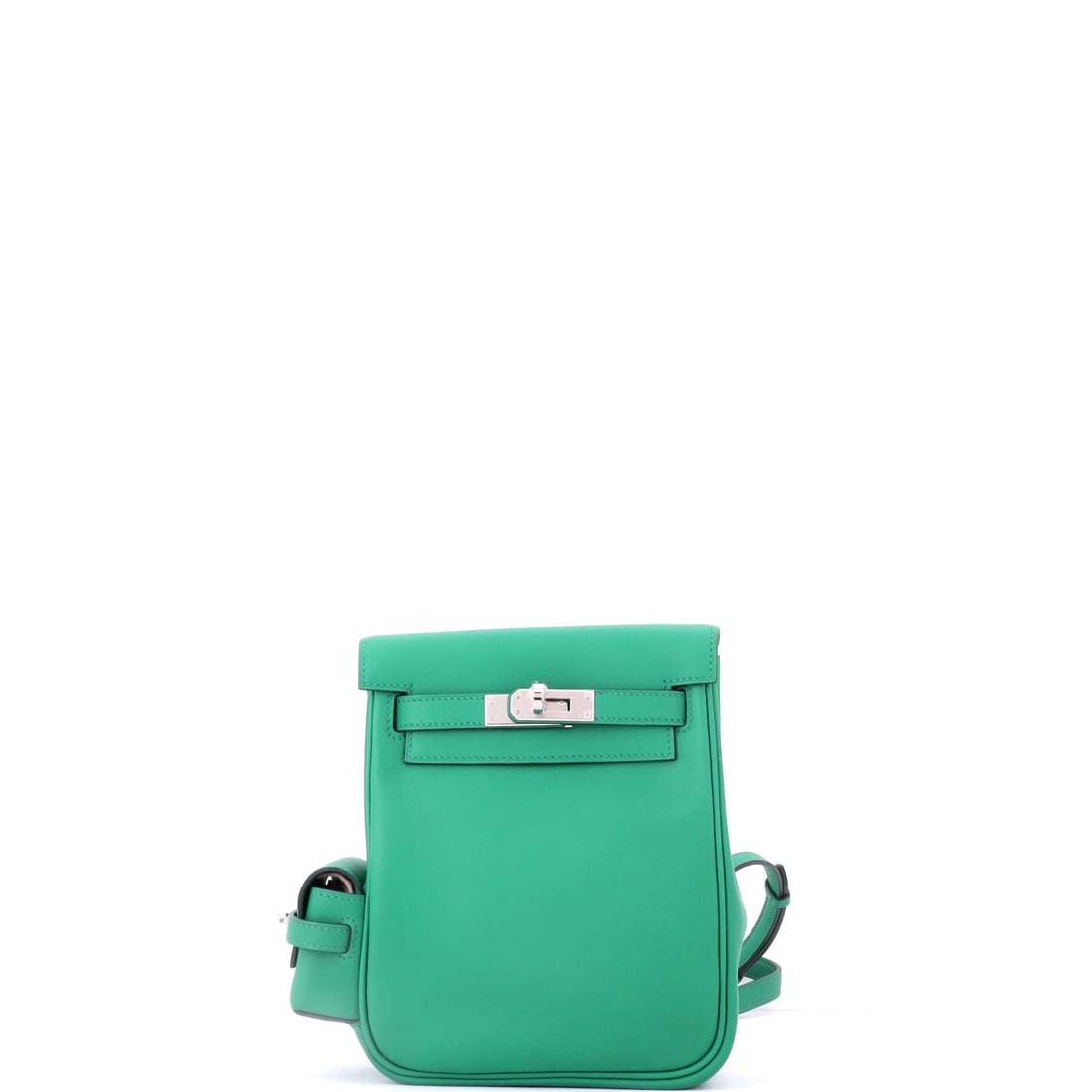 Hermes Kelly Jump Backpack Swift: Swift takes color hard and stays smooth, which suits a backpack this small, since 5.5 x 9 x 3 in is essentials only: phone, cardholder, keys. The Jump construction reworks Kelly cues for a body-worn s