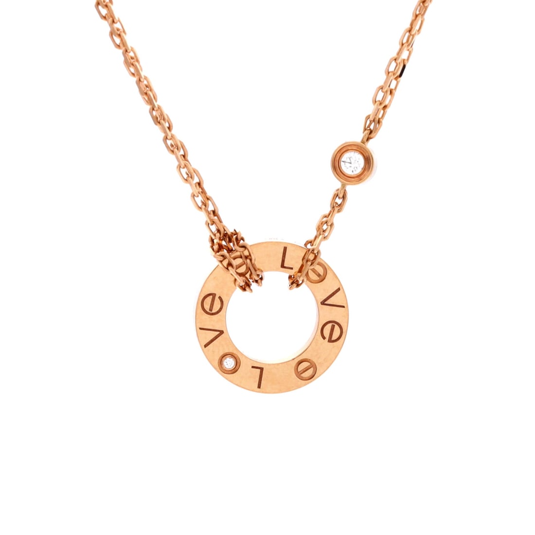 Cartier 2 Diamonds Love Pendant Necklace 18K Rose Gold and Diamonds: Cartier miniaturizes the Love bracelet's hardware into a 13.05 mm plaque here, screws and all, with two diamonds set flush into the pattern. Adjustment between 15 and 16.25 inches means it can be worn