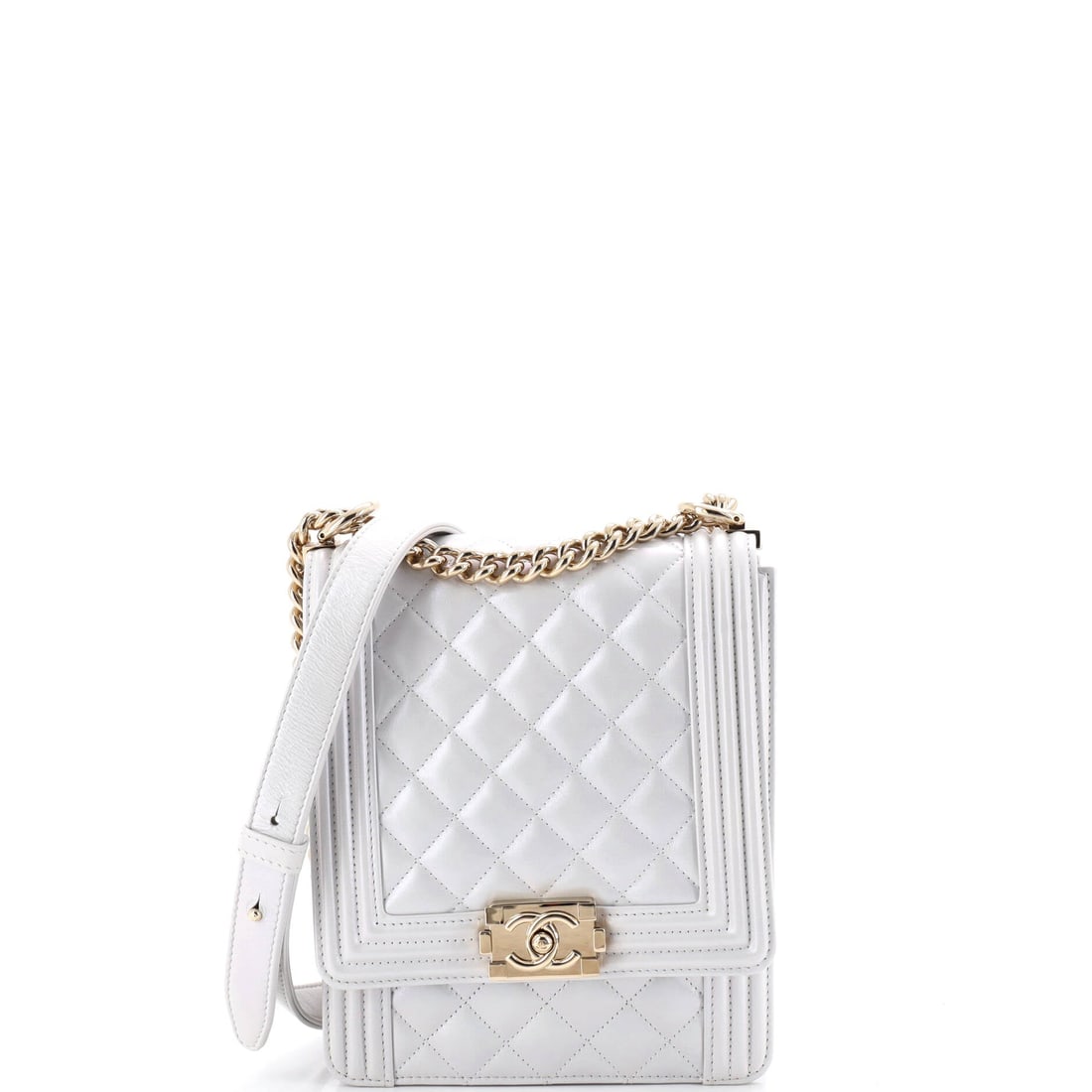 Chanel North South Boy Flap Bag Quilted Iridescent Calfskin: Iridescent calfskin shifts color as the bag moves, so on a tall north-south Boy the whole 7.5 inch height changes tone as you walk. Six inches wide and 2 through, it is a slim vertical package with a 