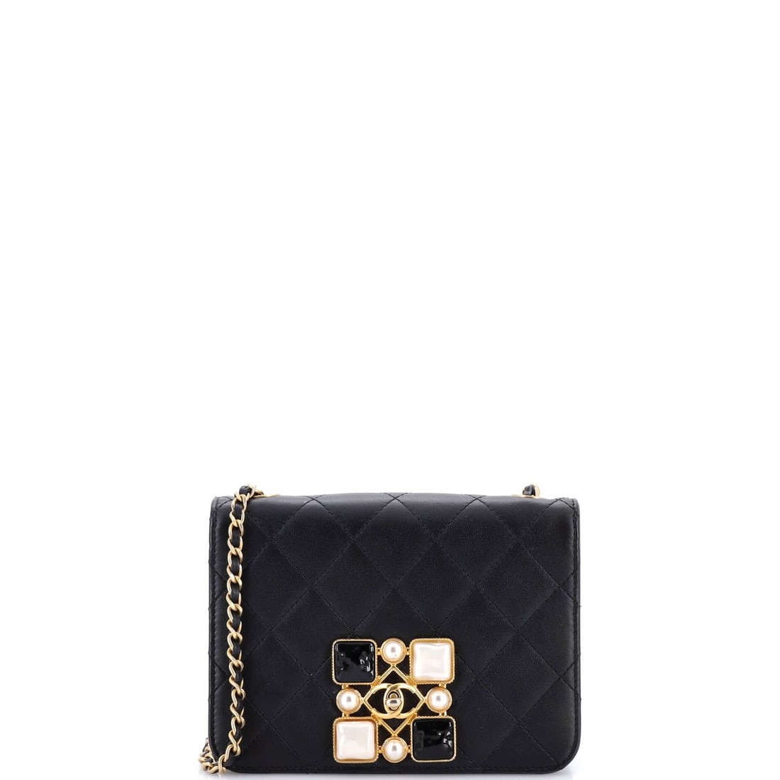 Chanel Resin and Pearl CC Full Flap Bag Quilted Calfskin: The full flap construction gives this one a cleaner front than a partial flap, which lets the resin and pearl CC sit as the single focal point. Pearl accents on a CC read softer than polished metal, a