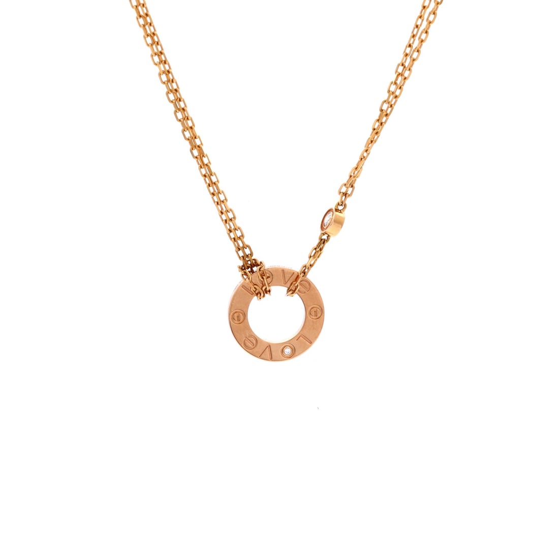 Cartier 2 Diamonds Love Pendant Necklace 18K Rose Gold and Diamonds: Two flush diamonds and a screw-marked square in 18K rose gold: the Love pendant works because the motif survives shrinking to 13.05 mm. The chain runs 15 to 16 inches, a short range that keeps the pla