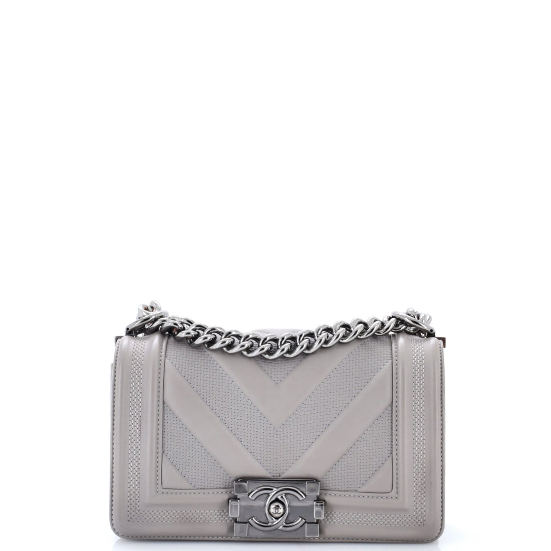 Chanel Boy Flap Bag Perforated Chevron Lambskin: Perforation over chevron lambskin turns the quilting into something closer to a pattern of pinpricks, catching light in a way flat leather does not. Slimmer than most at 2.5 inches deep, with an 8 by 