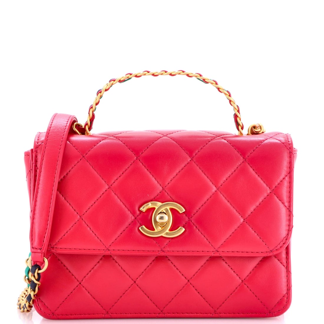 Chanel Logo Links Top Handle Flap Bag Quilted Calfskin: Chain links forming the logo give this top handle flap its detail, set into quilted calfskin that holds a firm rectangle at 7.5 by 5.5 inches. Three inches of depth is a lot on a bag this width, so it