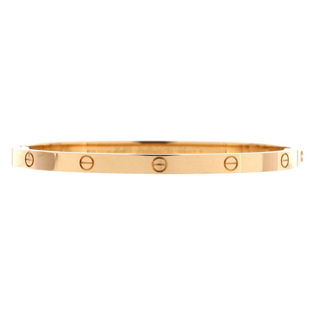 Cartier Love Bracelet 18K Yellow Gold: Grade A - Pristine, unusual for a bangle meant to stay on the wrist for years at a time. Yellow gold and a 3.6 mm width put this one in the small model camp, sized close for a slim wrist. The screw mo
