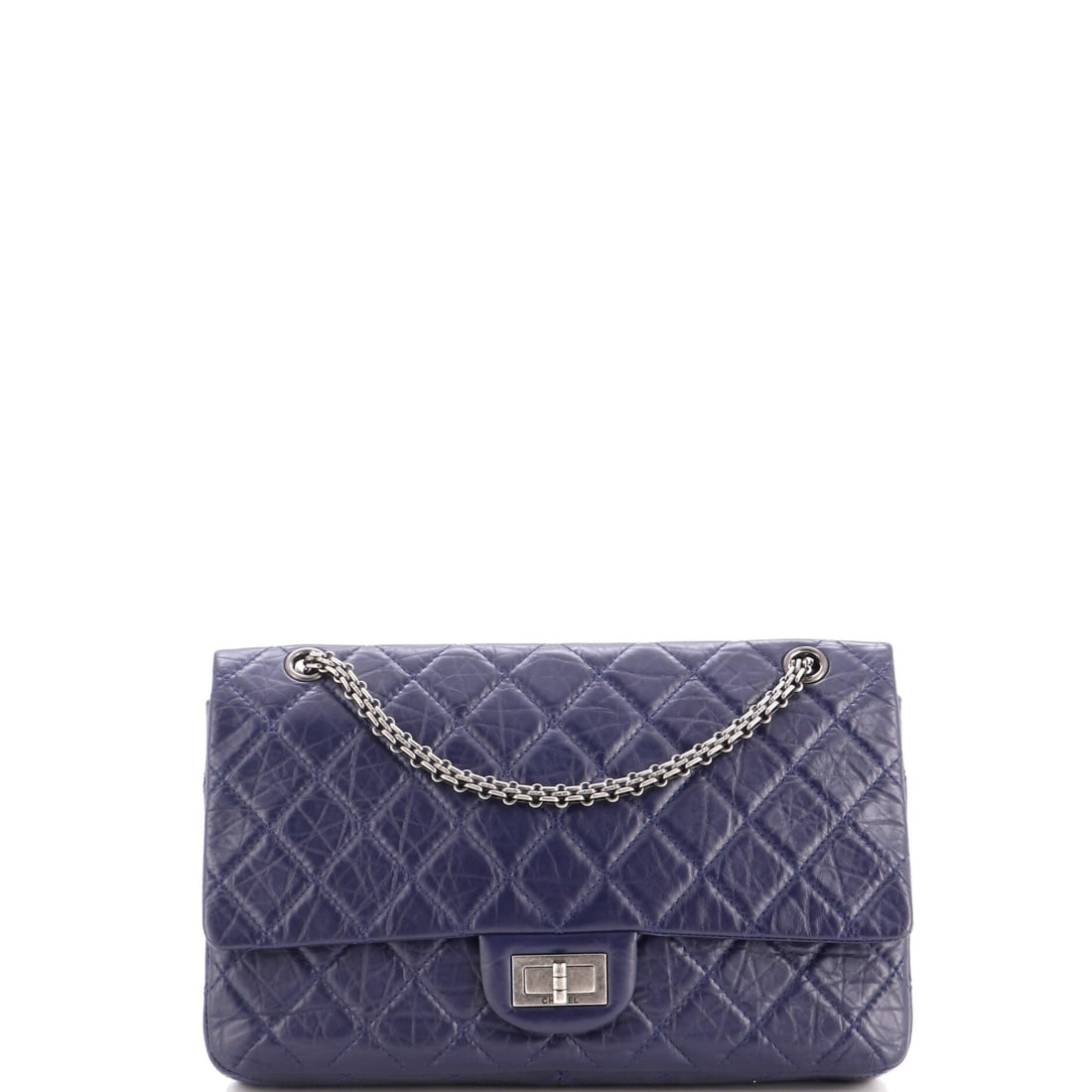 Chanel Reissue 2.55 Flap Bag Quilted Aged Calfskin: Twelve inches across puts this Reissue 2.55 at the upper end of the line's size range, with the quilting running in long rows over aged calfskin. Four inches of depth handles a long wallet, phone and 