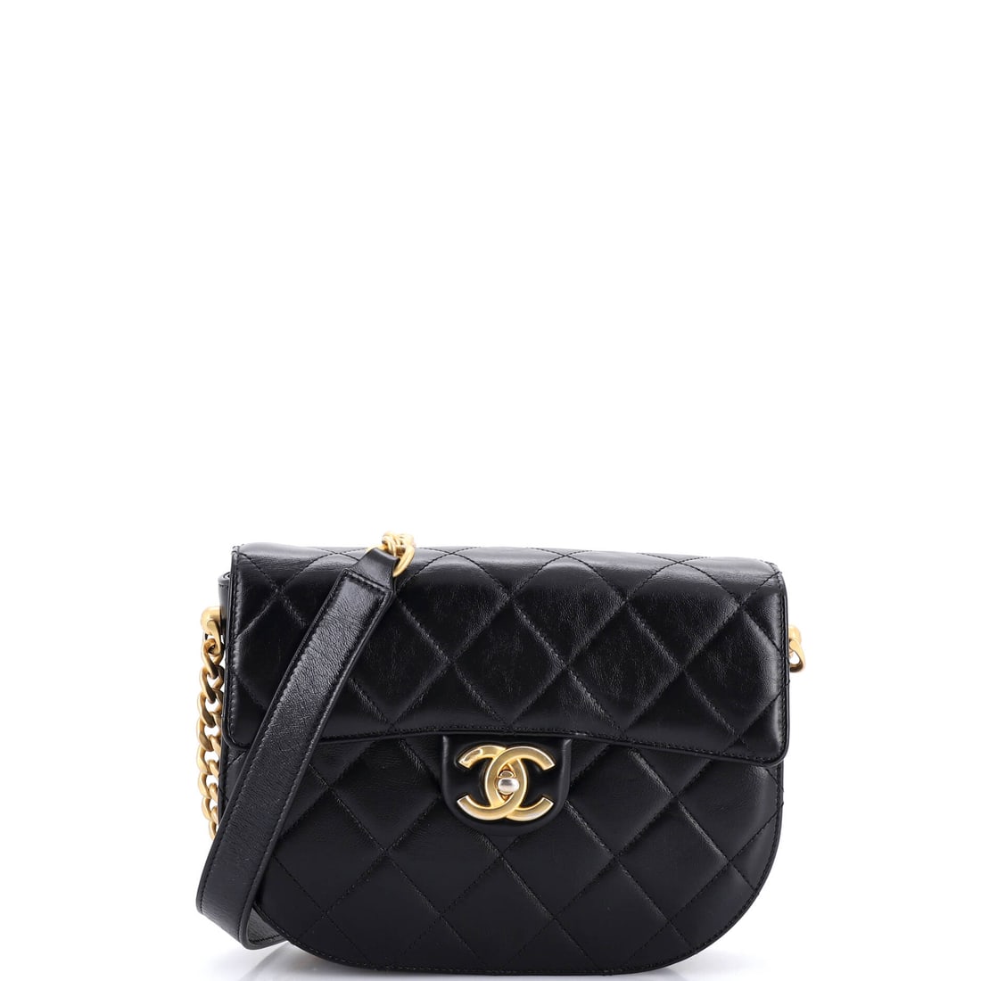 Chanel Moon Flap Messenger Bag Quilted Calfskin: Messenger geometry sets the Moon apart from Chanel's dressier flaps: a wide, shallow body at 9 by 6 inches and 2.5 deep, meant to be slung and forgotten. The 20 inch strap drop puts it at crossbody he