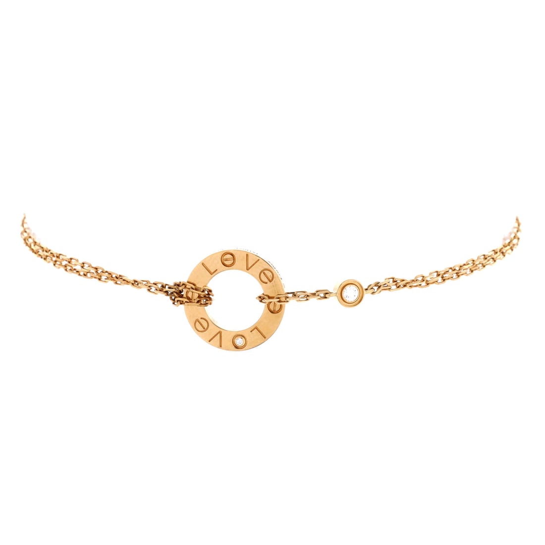Cartier 2 Diamonds Love Bracelet 18K Yellow Gold with Diamonds: 18K yellow gold puts the Love bracelet back in its original register, warm against skin, with two diamonds punctuating the run of screws. This one is Grade A - Pristine. The oval form sits close and d