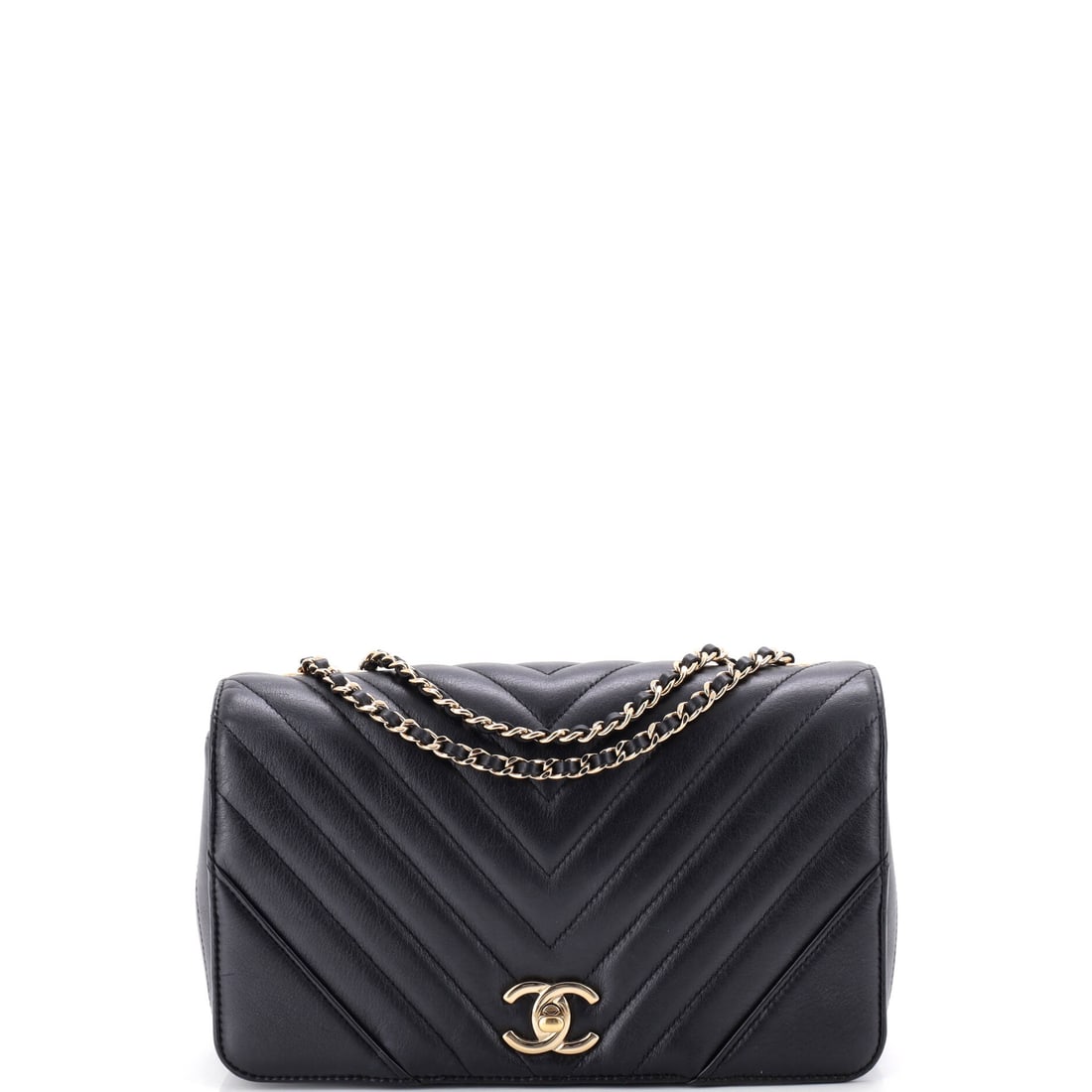 Chanel Statement Flap Bag Chevron Calfskin: Calfskin chevron across a 9.5 inch face is what earns the Statement flap its name; the panel is wide enough for the pattern to run uninterrupted. At 6 inches high and 3 deep it takes a full day of con