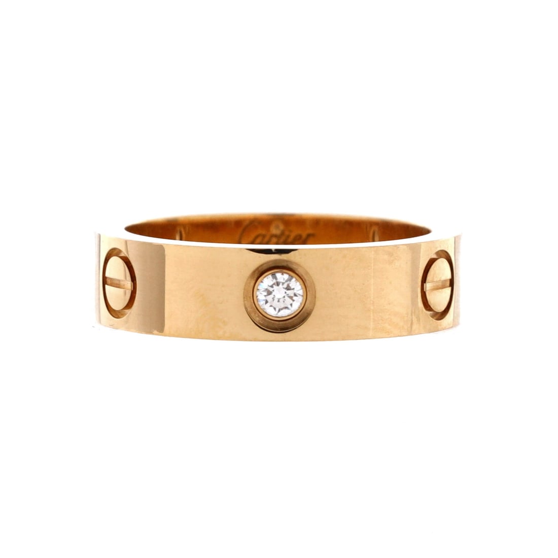 Cartier Love 3 Diamonds Band Ring 18K Yellow Gold with Diamonds: Yellow gold pushes the Love band's screws forward, and the three diamonds cut across that rhythm at intervals. Width runs 5.5 mm, substantial on the finger and better suited to wearing solo than in a 