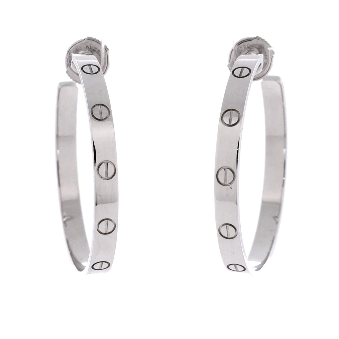 Cartier Love Hoop Earrings 18K White Gold: Considerably larger than the small Love hoops, this white gold pair drops 1.34 inches on a 3.6 mm band, which moves them into statement scale. The screw heads grow with the diameter, so the motif is l