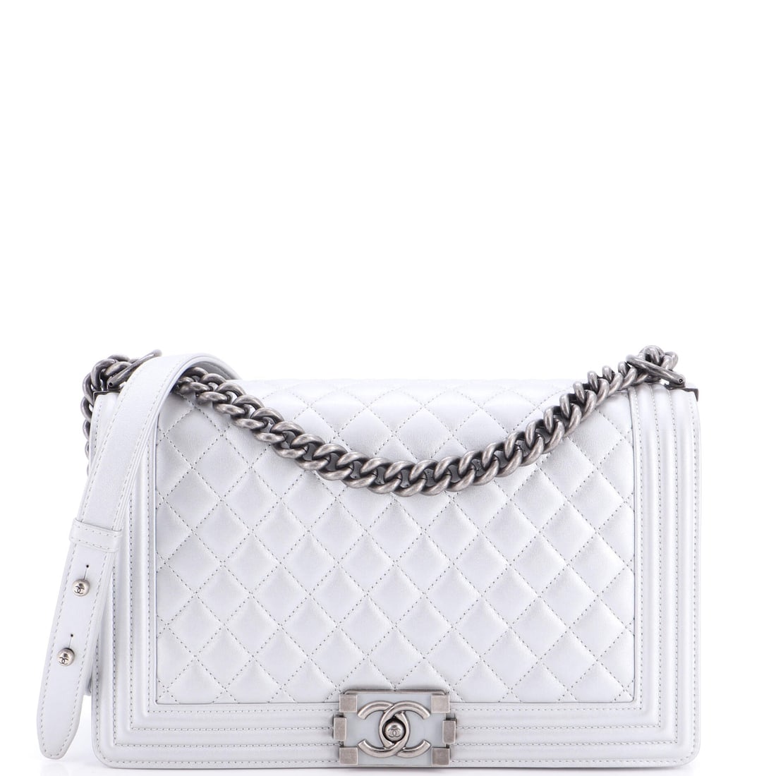 Chanel Boy Flap Bag Quilted Metallic Calfskin: Chanel's Boy flap in quilted metallic calfskin, built on the boxy rectangular frame that gives the line its architectural read. At W 11 x H 7 x D 3.5 in it sits at the larger end of the Boy family, de