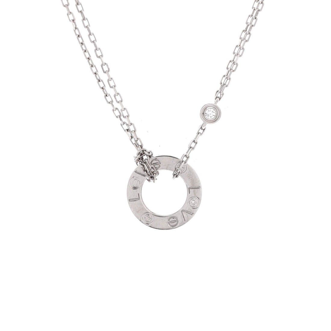 Cartier 2 Diamonds Love Pendant Necklace 18K White Gold with Diamonds: Worn high on a 15 to 16 inch chain, this white gold Love pendant reads as a small bright point rather than a pendant with presence. Its 13 mm motif carries two diamonds within the screw sequence. It g
