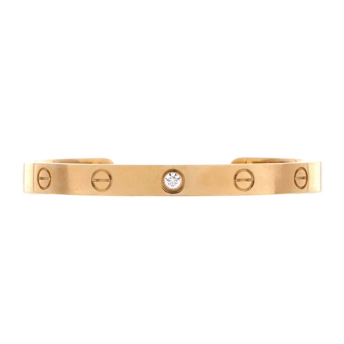 Cartier Love 1 Diamond Cuff Bracelet 18K Yellow Gold with Diamond: Yellow gold carries the screw motif at a full 6.15 mm here, with a diamond standing in for one of the heads. Being the cuff, it is open at the back and goes on and off in seconds instead of asking for