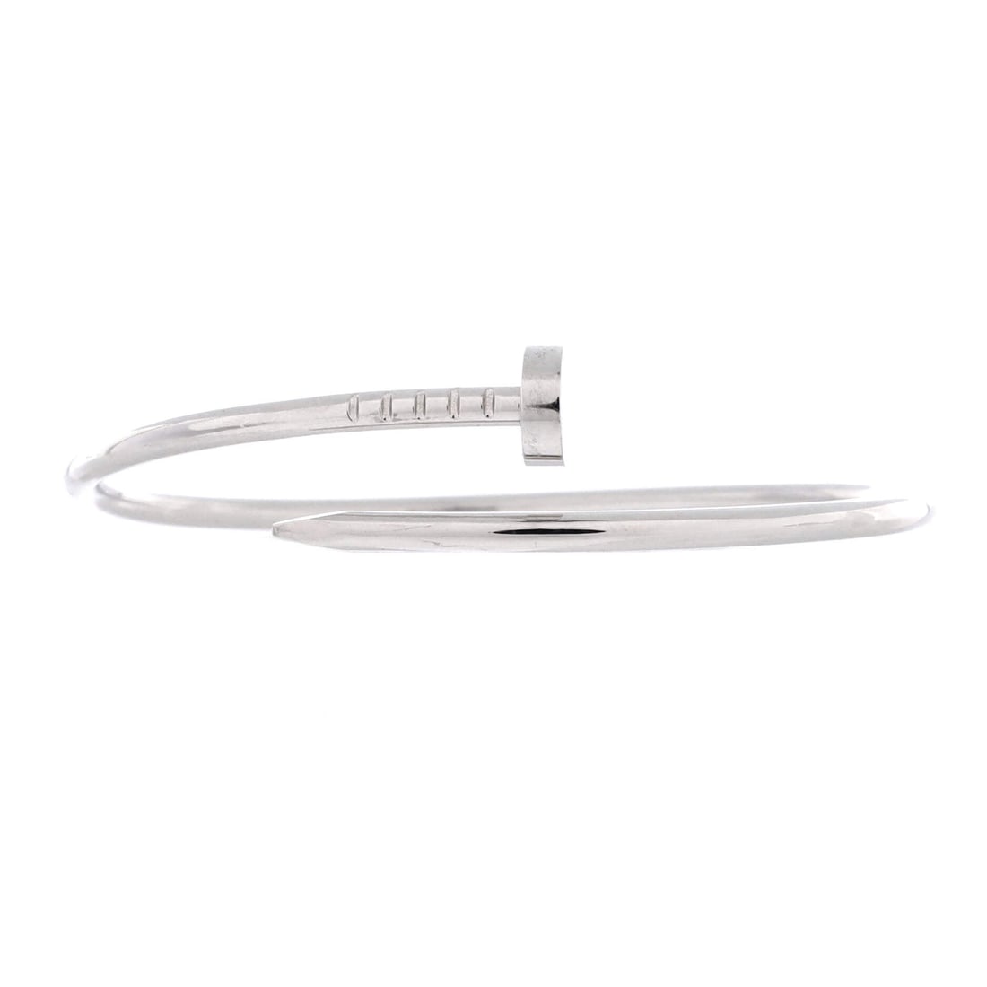 Cartier Juste un Clou Bracelet 18K White Gold: White gold gives the wrapped nail a colder, more architectural read than the rose or yellow versions, which is exactly the appeal for some bidders. The shank is the slim 2.5 mm, so it sits light and l