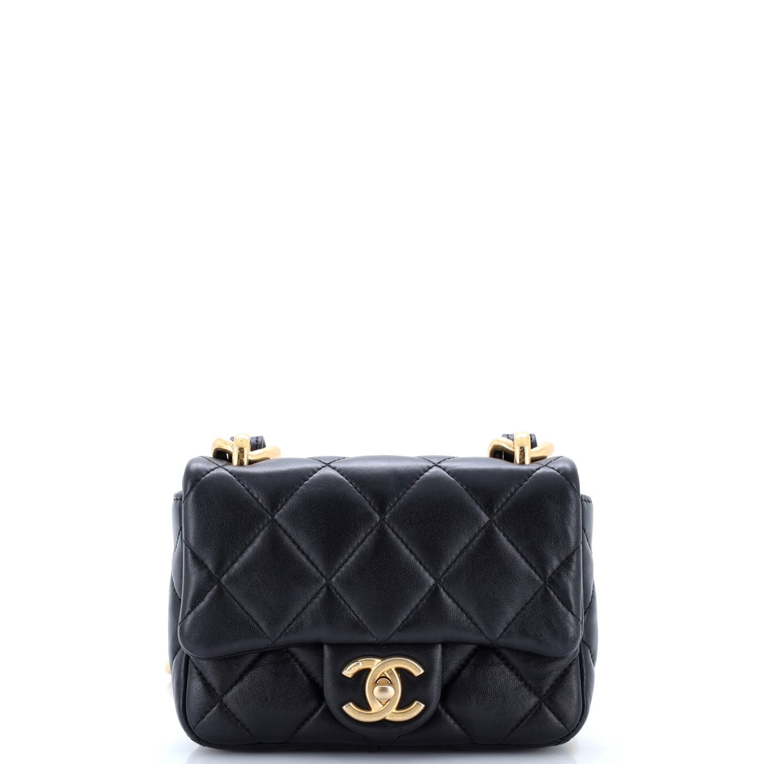 Chanel Funky Town Flap Bag Quilted Lambskin: Quilted lambskin on a small frame is what the Funky Town flap is about, 6.5 inches wide, 5 high and 2 deep, a mini-plus scale that holds a phone and cards. Lambskin gives the quilting depth and a soft