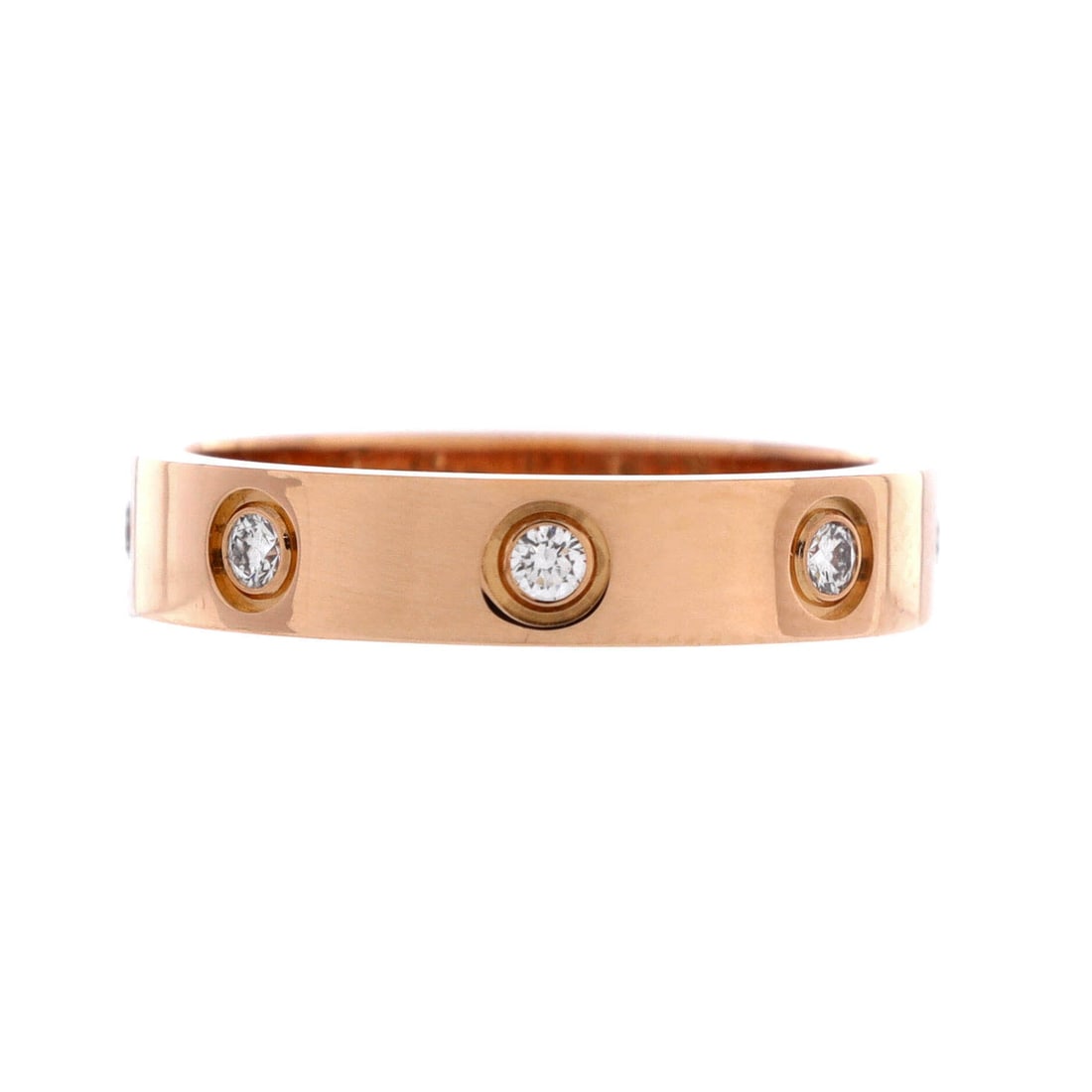 Cartier Love Wedding Band 8 Diamonds Ring 18K Rose Gold with Diamonds: Cartier's diamond wedding band interrupts the Love screws with eight brilliants, a small change that lifts the piece into evening territory. Width runs 3.95 mm, substantial enough to wear alone on the