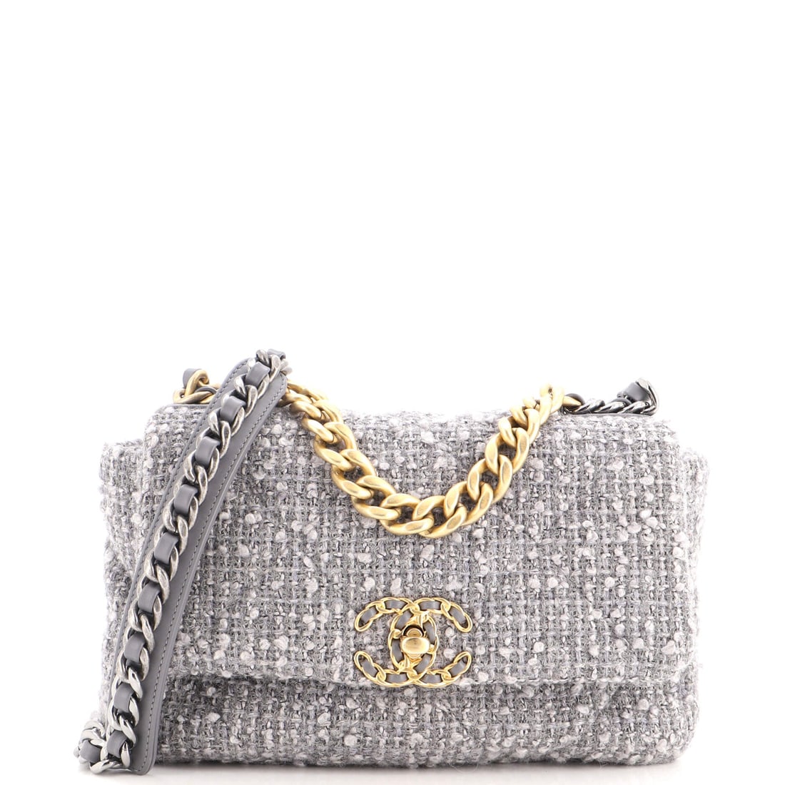 Chanel 19 Flap Bag Quilted Tweed: Tweed changes the read of a 19 completely, since the quilting is stitched through woven cloth and the diamonds arrive as texture rather than relief. Eleven inches wide and only 6 high gives a long, lo