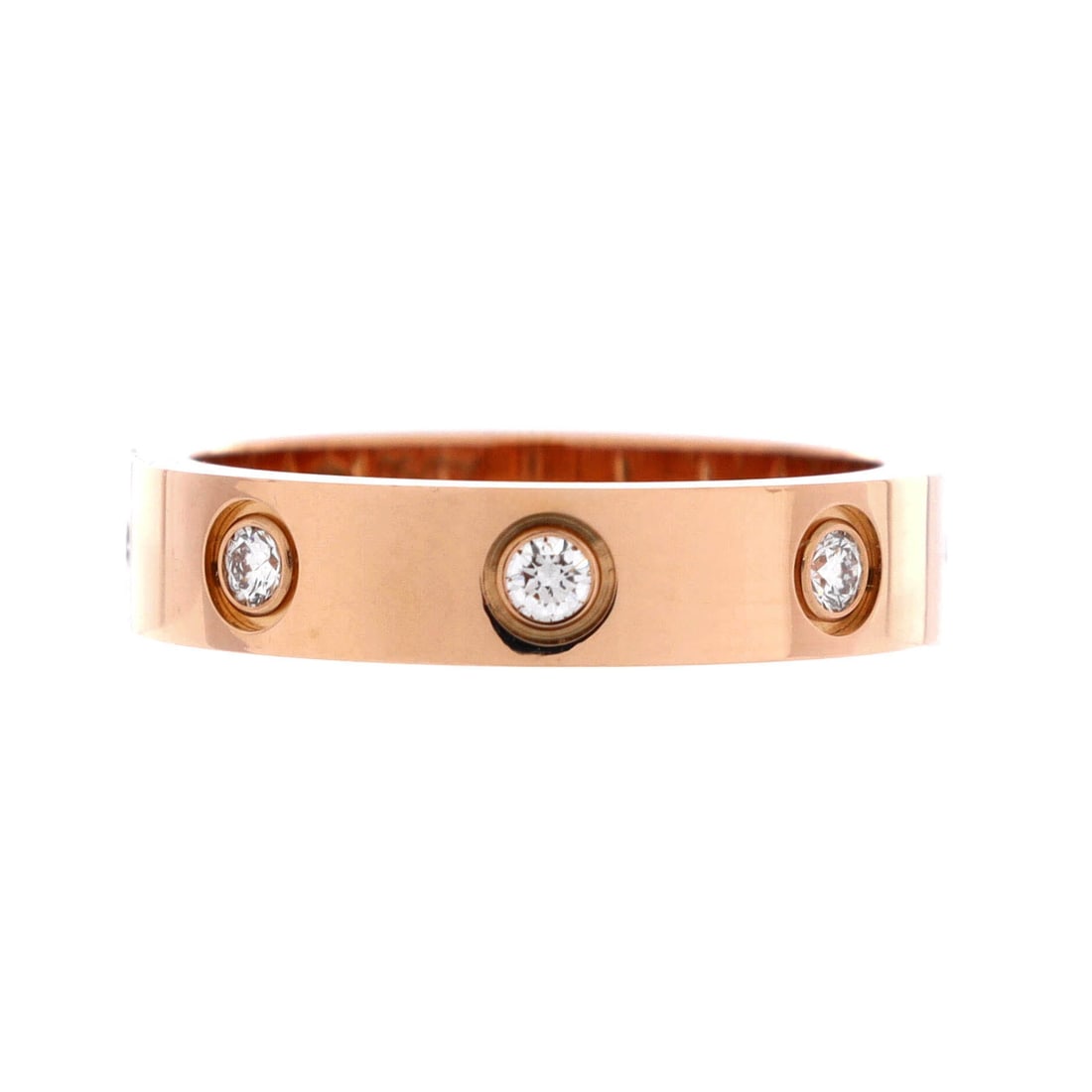 Cartier Love Wedding Band 8 Diamonds Ring 18K Rose Gold with Diamonds: Eight diamonds in rose gold, screw motifs between them, 3.95 mm of width: the Love wedding band is a simple equation and this one holds it cleanly. On a smaller finger that width reads as a bold band 