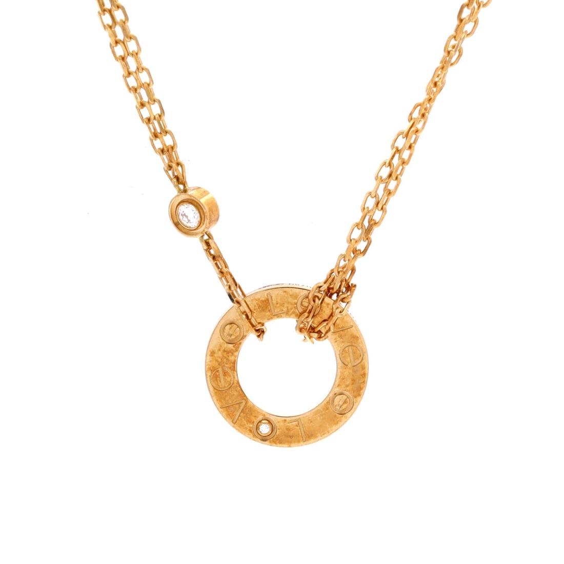 Cartier 2 Diamonds Love Pendant Necklace 18K Yellow Gold and Diamonds: Held at 14.75 to 16 inches, the chain keeps this Love pendant high enough to show above a closed collar. The 13.05 mm yellow gold plaque carries its screw detail and two set diamonds cleanly. Graded a
