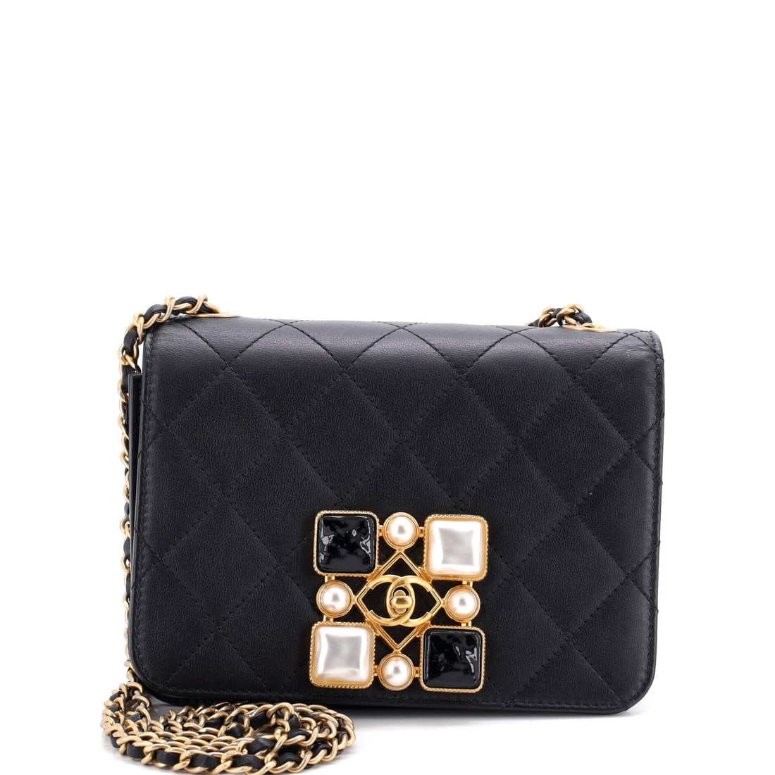 Chanel Resin and Pearl CC Full Flap Bag Quilted Calfskin: Pearl and resin hardware puts this full flap in the decorative end of Chanel's flap output, a bag chosen for the CC rather than for capacity. Seven inches wide and 2 in deep, it carries an evening's e