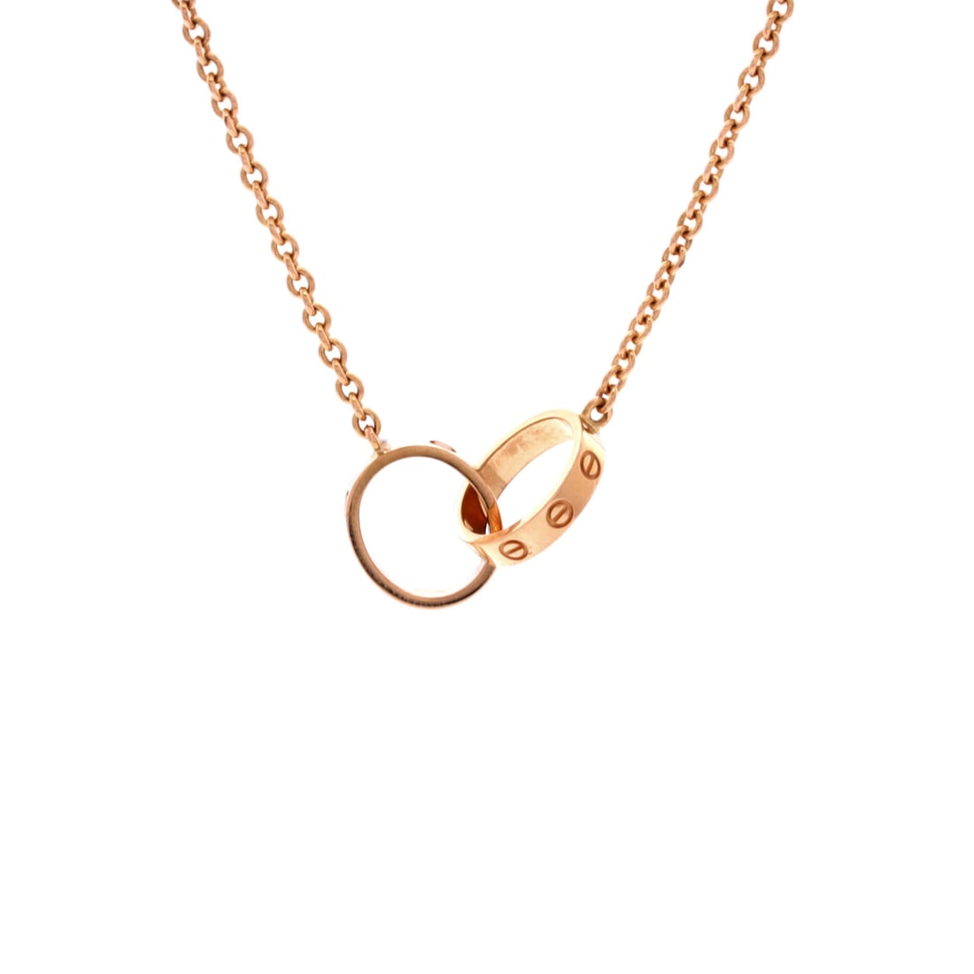 Cartier Love Interlocking Necklace 18K Rose Gold: Cartier's Love pendant works in pairs, one circle threaded through another with the screw detail on both, and at 9.5 mm by 20 mm the motif holds an open neckline without crowding it. The 17.25 in rose