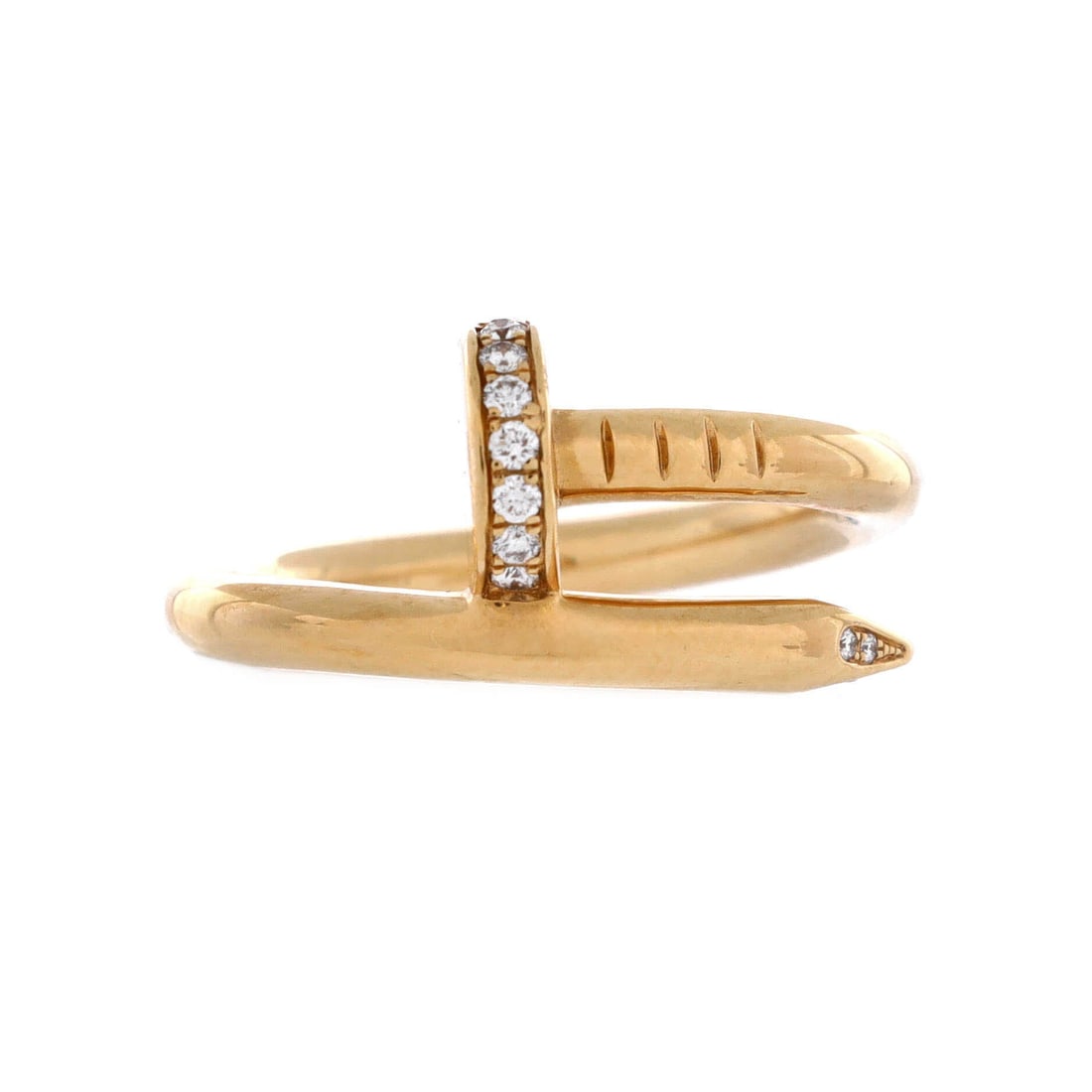 Cartier Juste un Clou Ring 18K Yellow Gold and Diamonds: Diamonds trail along the 2.6 mm shank of this yellow gold Juste un Clou, lighting the curve where the nail doubles back on itself. Slim bands like this sit flat under a bangle or against a plain weddi