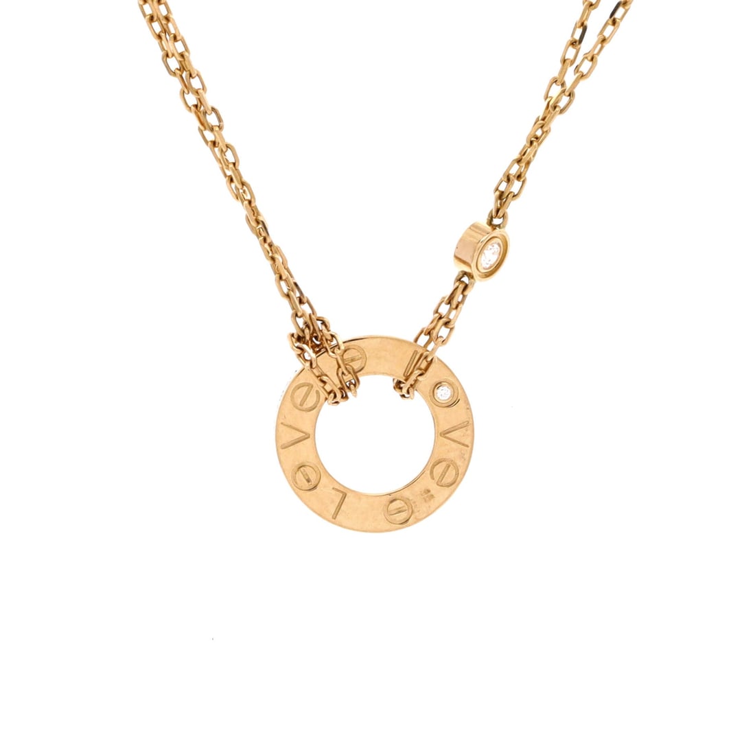 Cartier 2 Diamonds Love Pendant Necklace 18K Yellow Gold and Diamonds: The shortest chain in this group runs 14.25 to 15.75 inches, which places the plaque high on the neck rather than out on the chest. Yellow gold and two flush diamonds fill the 13.05 mm motif. Grade B 