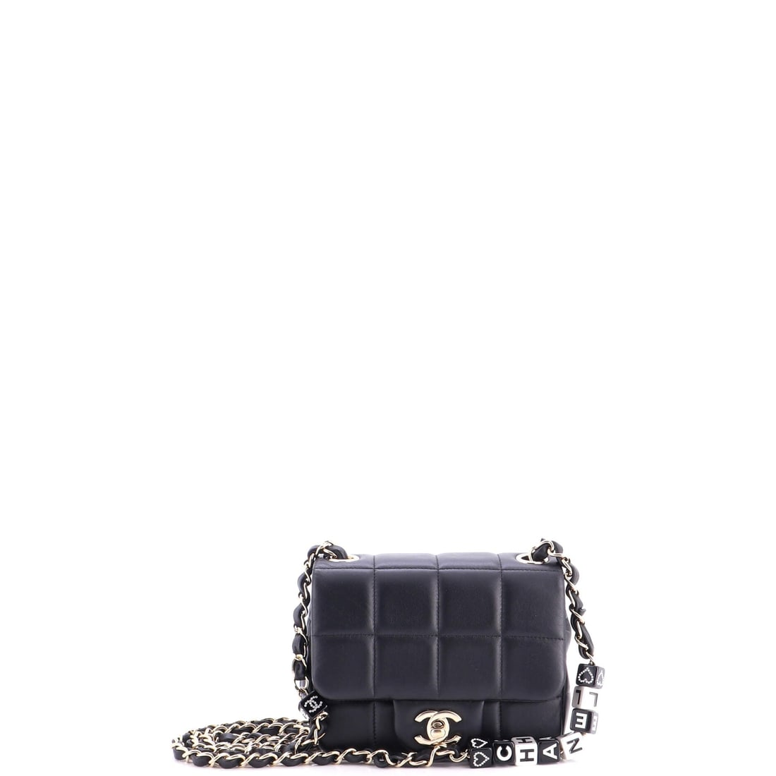 Chanel Monacoco Logo Blocks Square Flap Bag Quilted Lambskin with Resin: Square flaps read differently from rectangular ones, and 6 by 5 inches on a 3 inch base makes this nearly a box, standing upright on a table instead of flopping. The Monacoco logo blocks in resin are 