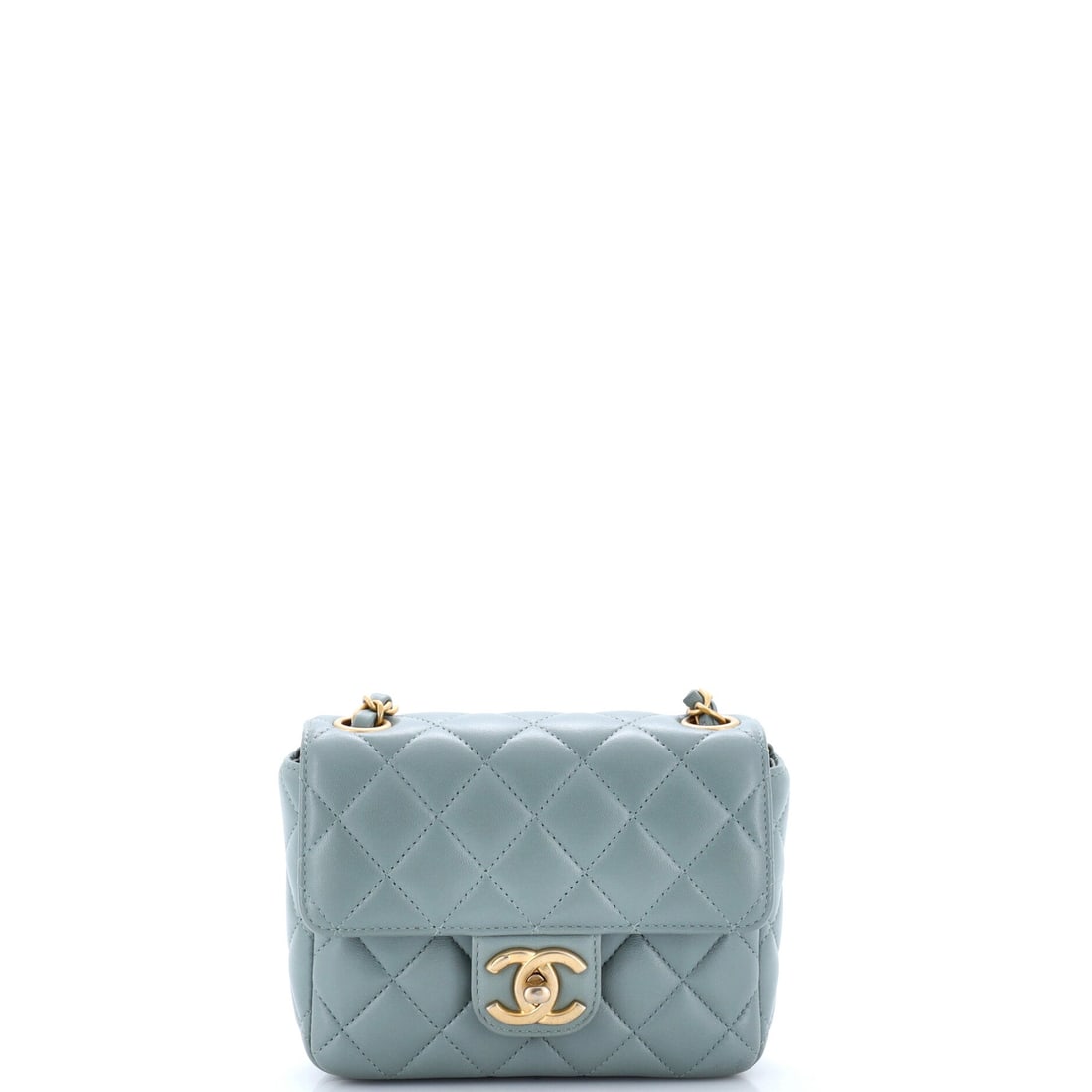 Chanel Casino Royale Charms Square Flap Bag Quilted Lambskin with Enamel: Casino charms in enamel hang from the square flap, and they are the reason buyers seek this model out. The 6 by 5 inch square body with 3 inches of depth is compact but not flat, so it functions as we