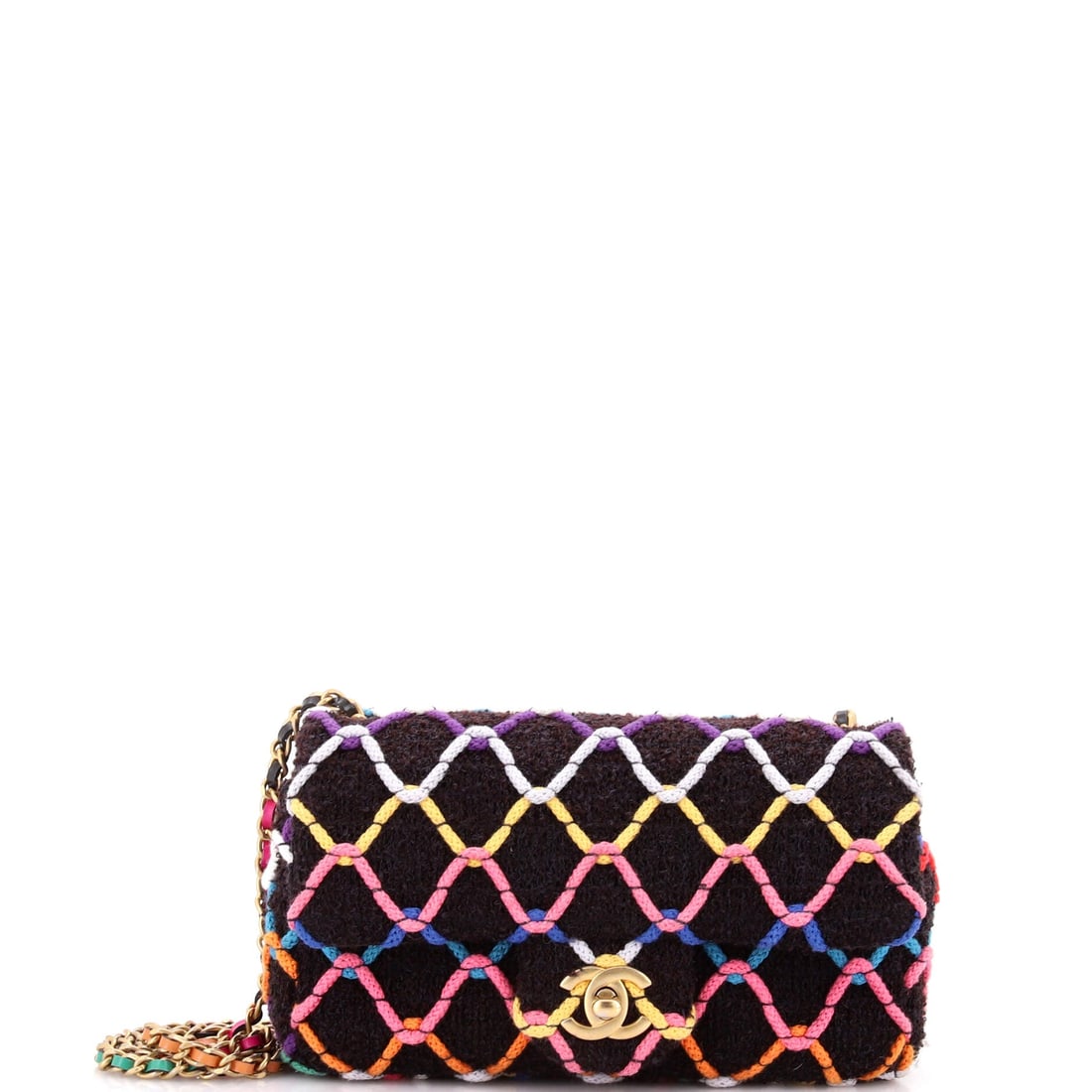 Chanel Pearl Crush Flap Bag Quilted Tweed: Woven tweed swaps in for lambskin on this Crush flap, and the fabric takes quilting with a softer, more textural line. Eight inches across by five high, it is cut to the same light-carry brief as its 