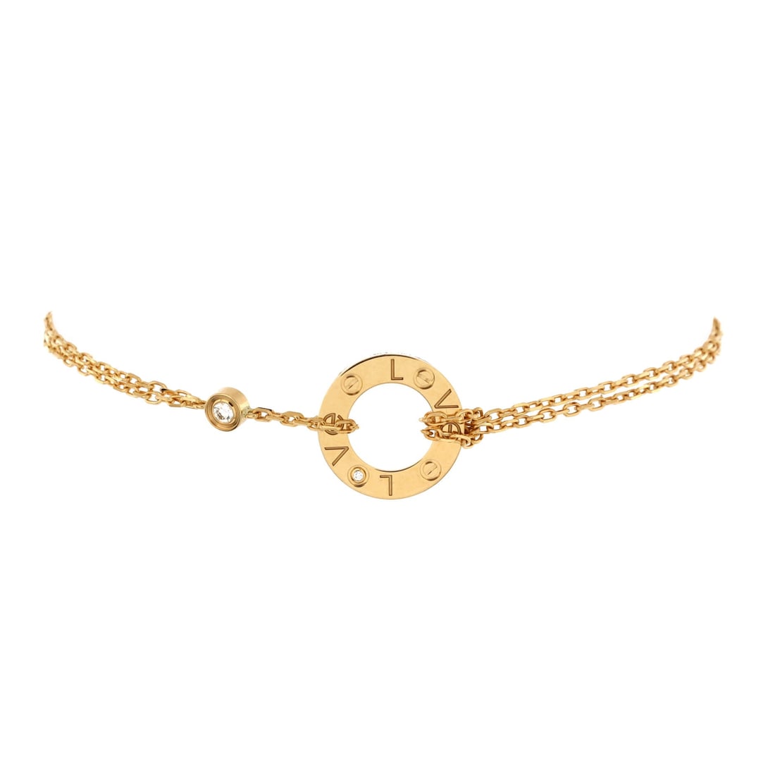 Cartier 2 Diamonds Love Bracelet 18K Yellow Gold with Diamonds: Two diamonds sit flush in the yellow gold, standing in for screws in a sequence that needs no logo to be recognized. The bangle is hinged and screw-closed, meaning it is worn continuously rather than 
