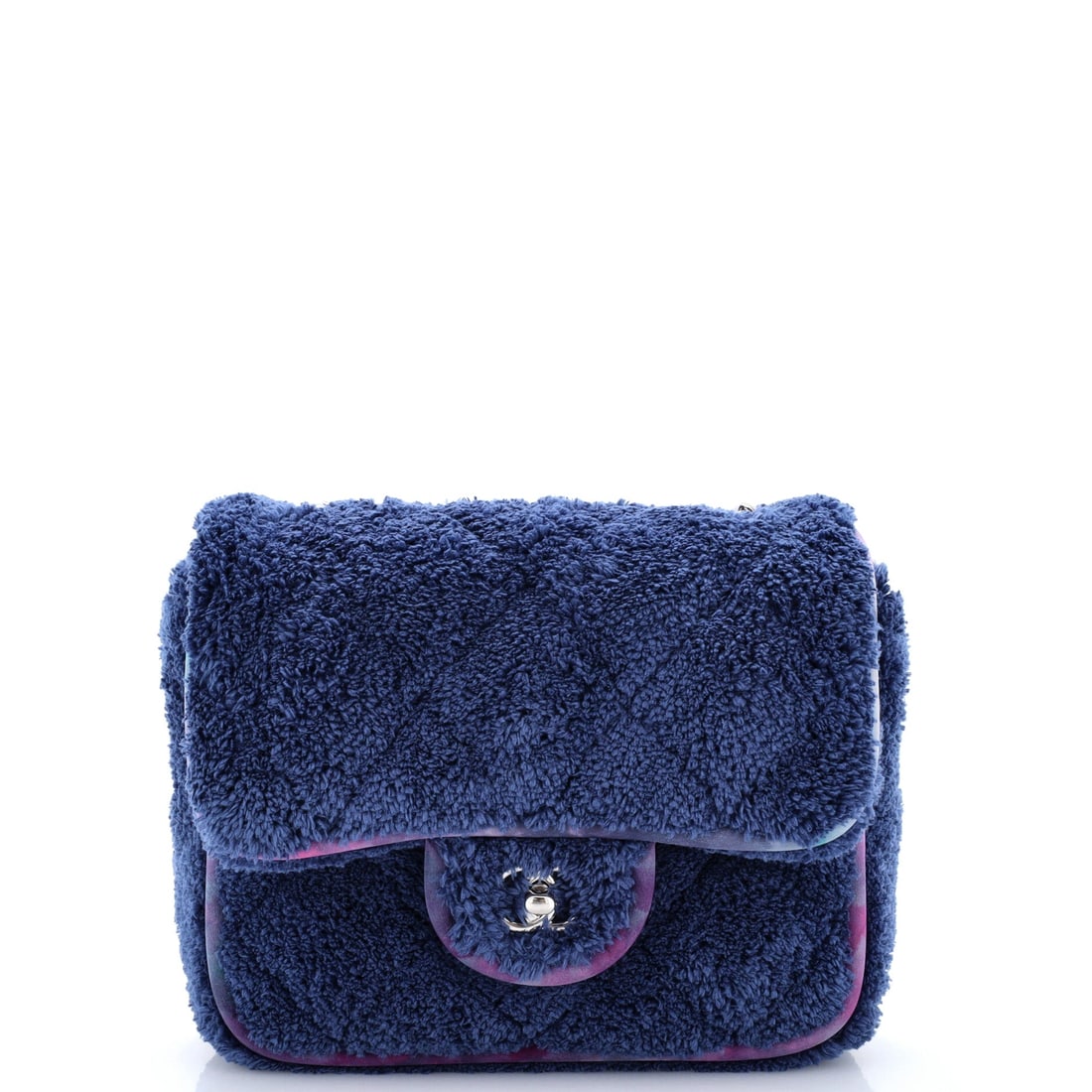Chanel Classic Single Flap Bag Quilted Terry Cloth and Ribbon: Terry cloth and ribbon put the Classic Single Flap into resort territory, a plush textured face where quilting reads as relief rather than shine. The 8 by 7 inch body with 3 inches of depth is genuine