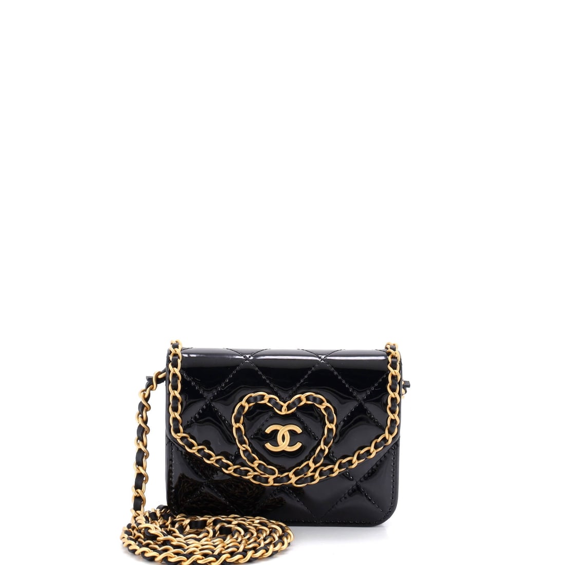 Chanel Heart Chain Flap Bag Quilted Patent: Heart-shaped, patent, and barely wider than a hand at 4.5 inches across by 3.5 high, this flap belongs with Chanel's dessert-course accessories rather than its workhorses. The 2 inch depth still swall