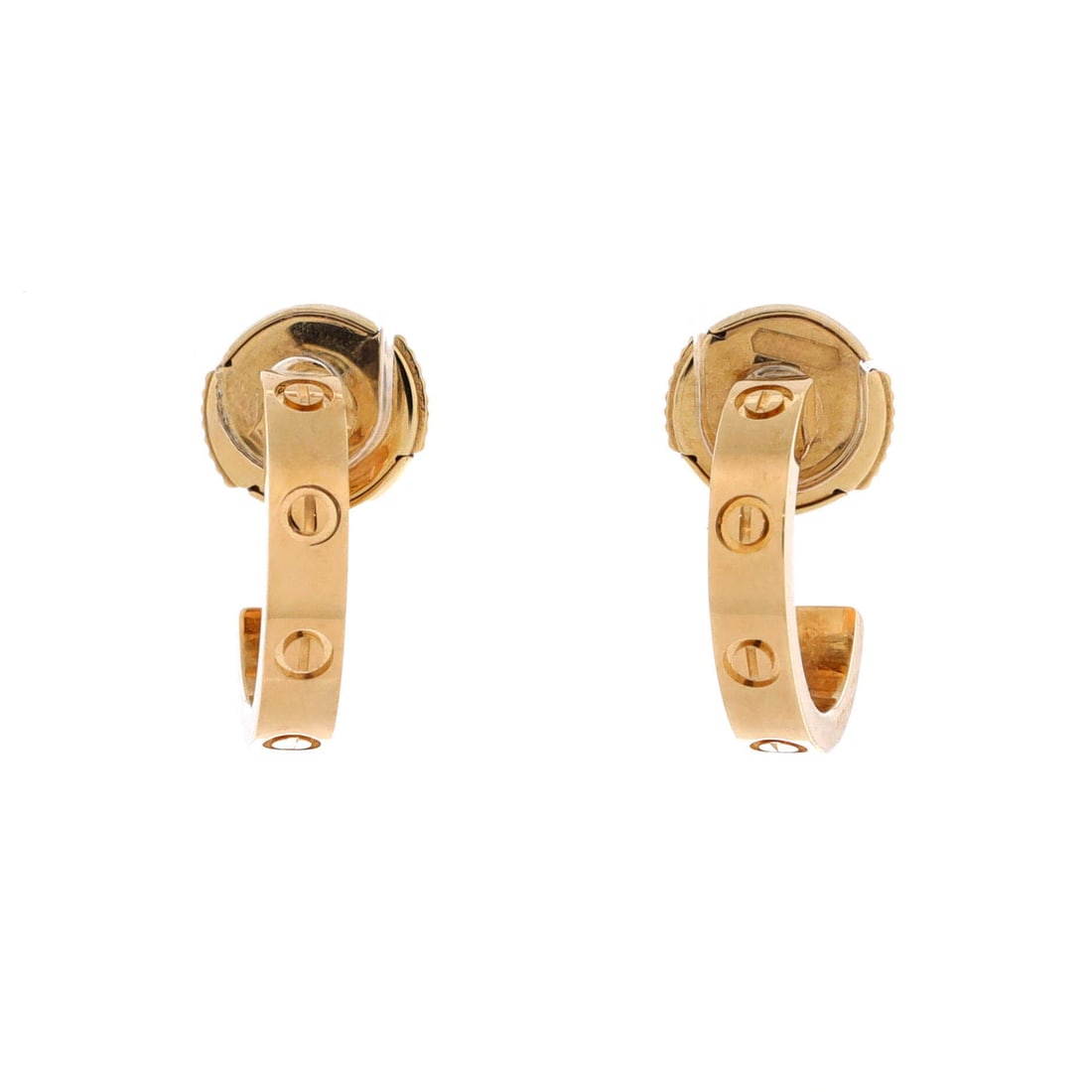 Cartier Love Hoop Earrings 18K Yellow Gold: Compact yellow gold hoops carrying the screw motif on a 2.65 mm band, with a 12.65 mm drop that holds them close to the ear. Worn daily, hoops at this scale disappear into a look rather than driving i