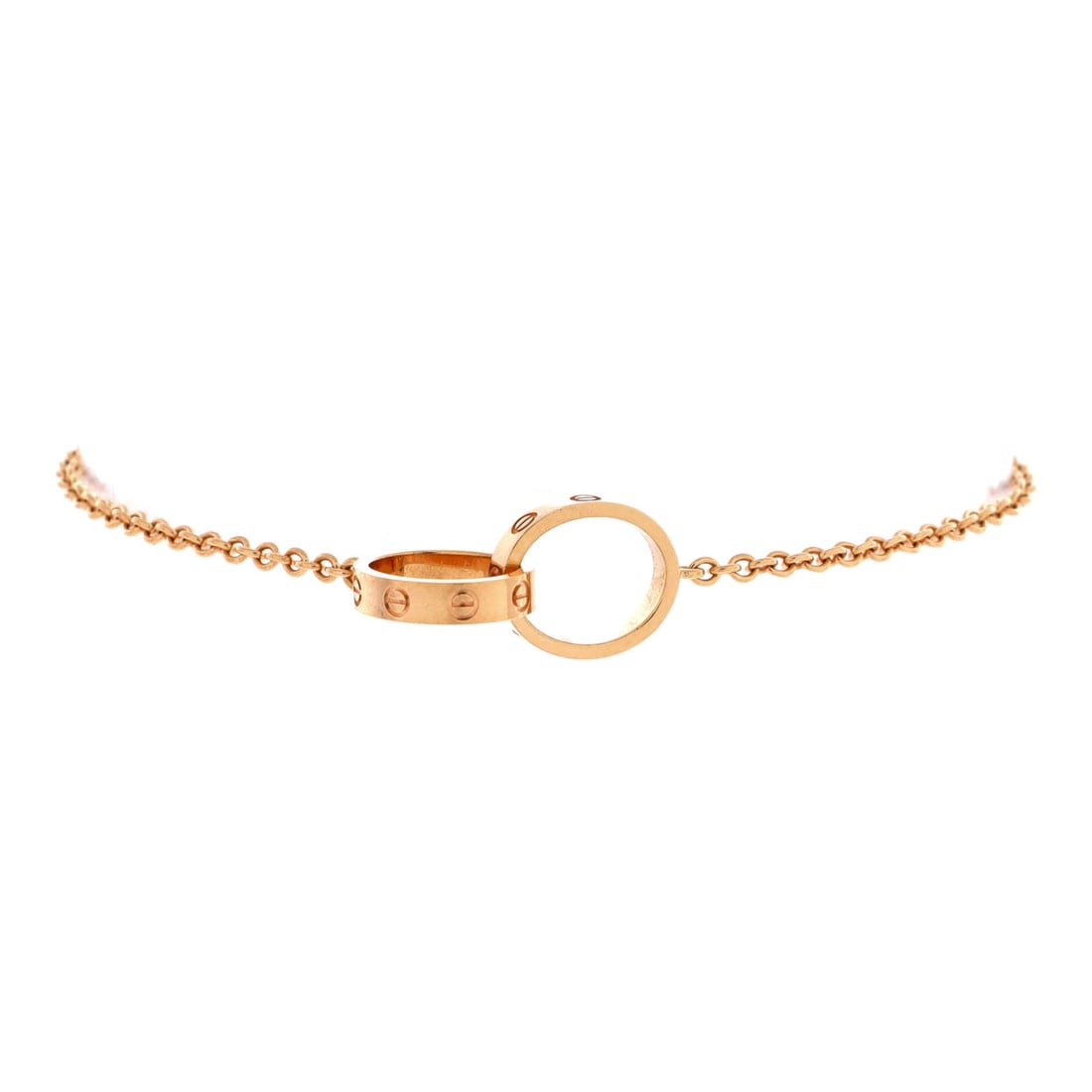 Cartier Love Interlocking Bracelet 18K Rose Gold: Chain-mounted rather than screwed closed, this Love Interlocking bracelet goes on and off in seconds, which is the practical case for it over the bangle. The two circles meet at a single point and the